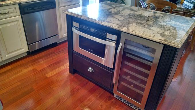 Island with microwave clearance and wine fridge